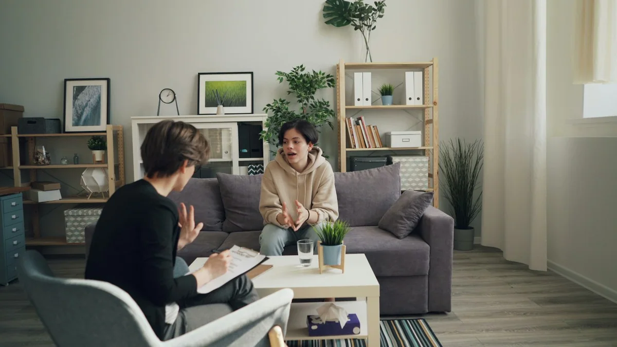 Therapist and client talking in a consulting room New Day Therapies Hull