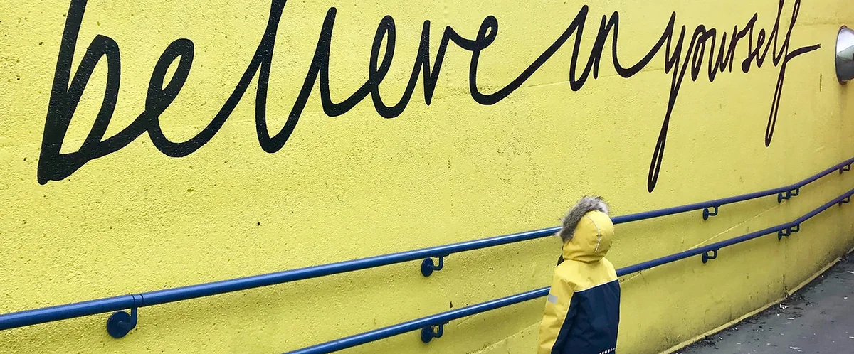 The words believe in painted on a wall, representing cognitive hypnotherapy New Day Therapies Hull